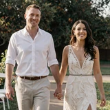 James and Jennifer holding hands at their wedding - trucker dating marriage success
