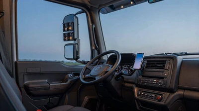 Truck cab interior with phone mounted on dash - online dating tips for truck drivers