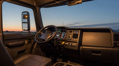 Semi-truck cab interior at dusk - how to date a truck driver