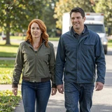 Tyler and Megan walking in a park - trucker dating success story