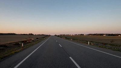Open American highway at dawn - long-distance trucker relationships
