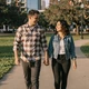 Robert and his partner holding hands at a Dallas park - trucker dating success