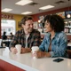 Robert and Tanya sharing coffee at a Houston diner - trucker dating success